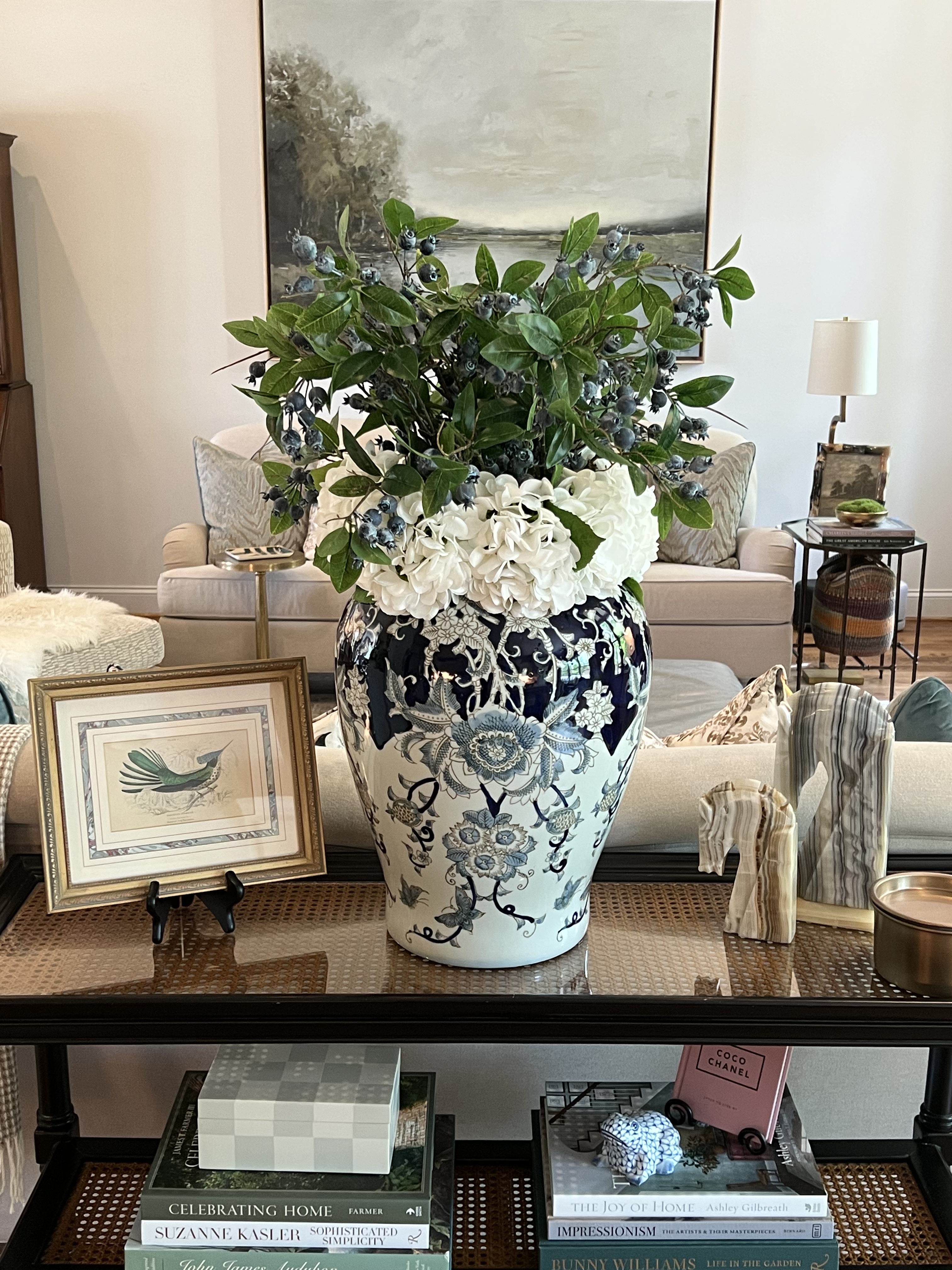 Styled living room with blue and white porcelain